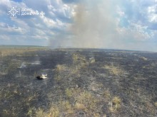 Тління поля. Здіймається дим.