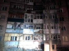 Пошкоджені багатоквартирні будинки після ворожого обстрілу