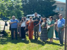 Учасники відкриття Алеї пам'яті виконують гімн