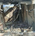 Зруйнований будинок після пожежі в результаті пожежі