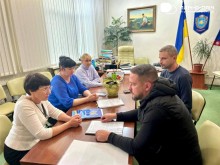 Заступник начальника Часовоярської міської військової адміністрації Руслан Прийменко та Ірина Плетньова - міський голова м.Умань обговорюють подальшу співпрацю.