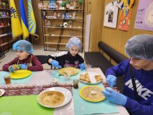 Участь дітей у кулінарному майстер – класі «Свято пухких млинців, присвяченому традиціям святкування Масляної