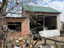 Пошкоджений ворожим обстрілом будинок