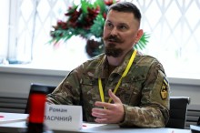 Учасник Всеукраїнської науково-практичної конференції з національно-патріотичного виховання під час пленарного засідання