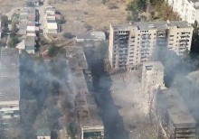 Зруйнований окупантами багатоповерховий будинок