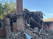 Зруйнований ворожим обстрілом будинок