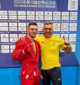 Владислав Руднєв разом із тренером Сергієм Руднєвим