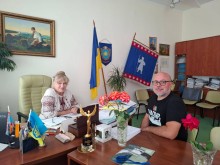 Сергій Чаус в кабінеті з представницею Уманської громади
