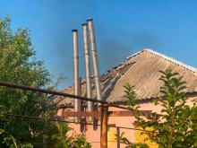 Пошкоджений будинок після ворожого обстрілу