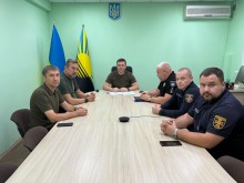 Нарада. За столом сидять представники силових структур та ДСНС. В голові стола заступник голови Донеччини Юрій Ключка та представники Покровської громади.