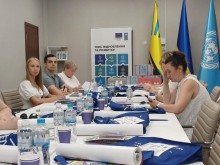 Учасники засідання під час обговорення питань