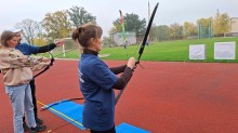 Ветерани та учасники обласних спортивних ігор "Степова міць" під час стрільби з лука