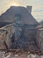 Зруйнований будинок та наслідки пожежи