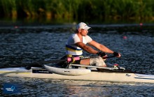 Роман Полянський у човні на змагальній дистанції чемпіонату світу з пара веслування