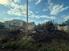 Зруйноване подвір'я після ворожого обстрілу