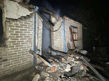 Зруйнована та згоріла через обстріл окупантів будівля.