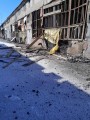 Зруйноване господарське приміщення після ворожого обстрілу