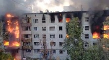 Зруйнований окупантами багатоповерховий будинок
