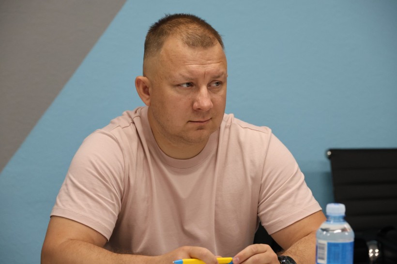 Учасник наради
