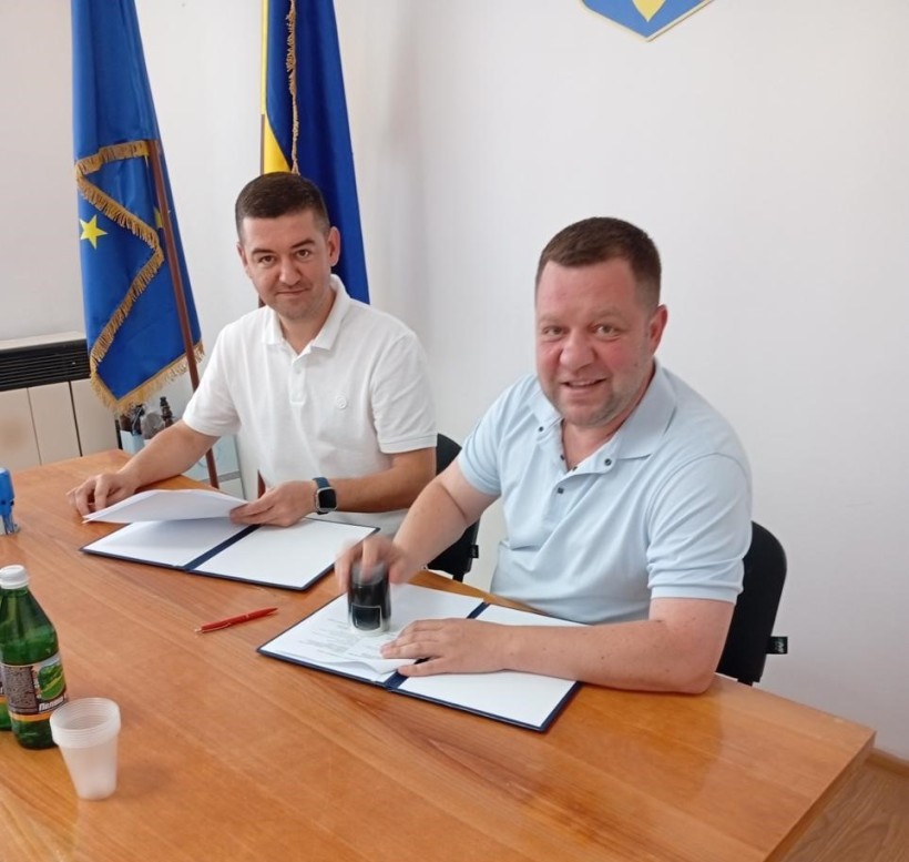 Представники РДА підписують меморандум