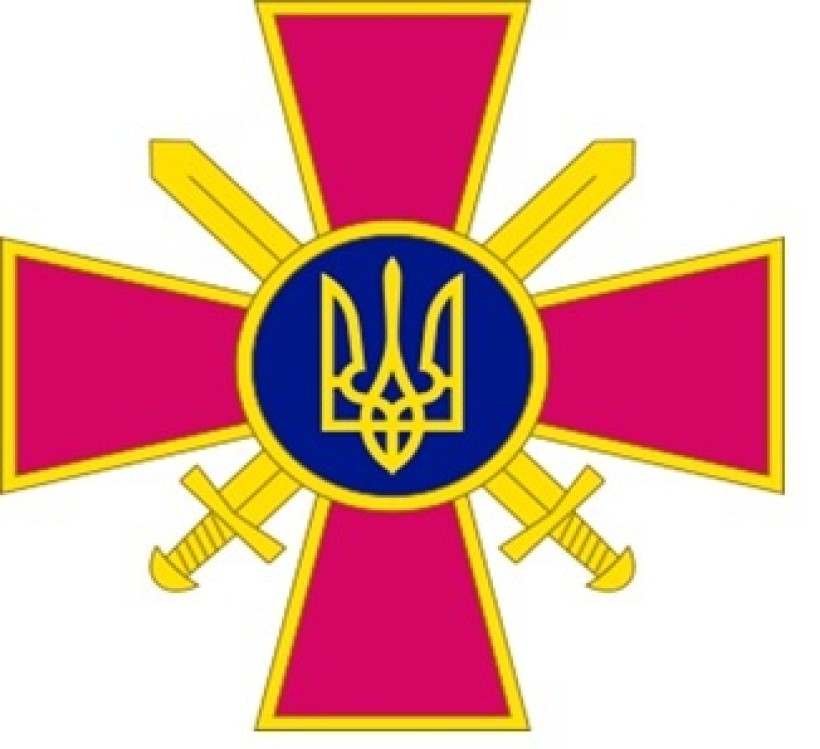 Червоний хрест із жовтими облямівками, у центрі якого зображено синє коло з жовтим тризубом. За колом зображено два схрещені жовті мечі.